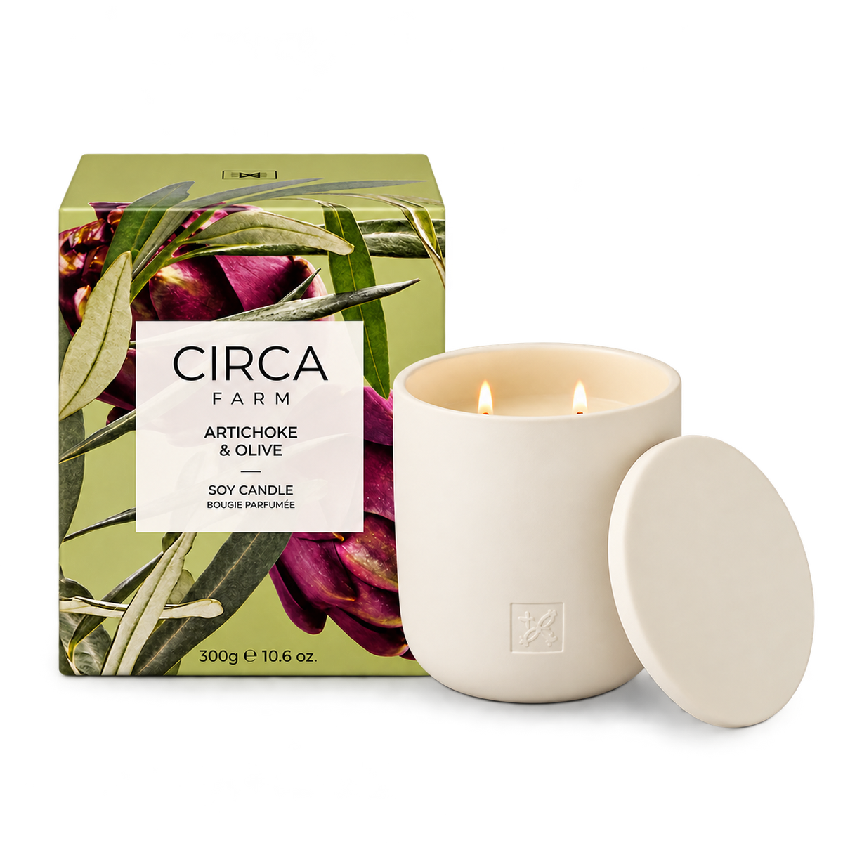 CIRCA Soy Candle Artichoke and Olive 300g in a cream ceramic vessel with lid beside artichoke print gift box