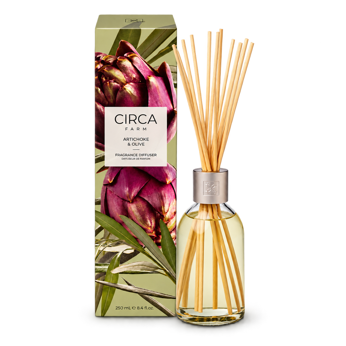 CIRCA Fragrance Diffuser Artichoke and Olive 250ml, glass reed diffuser bottle with reeds beside artichoke print box