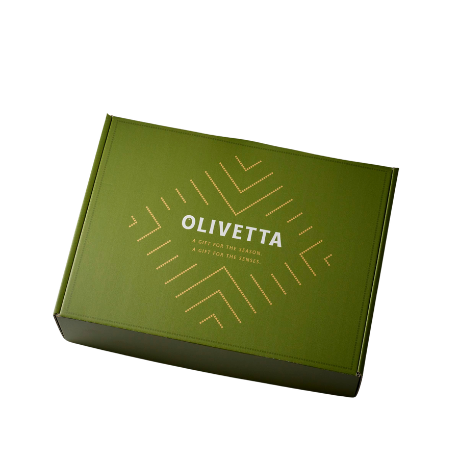 Olivetta Christmas gift box shown closed in its festive presentation packaging, ready for gifting with olive oils and balsamic vinegars inside.