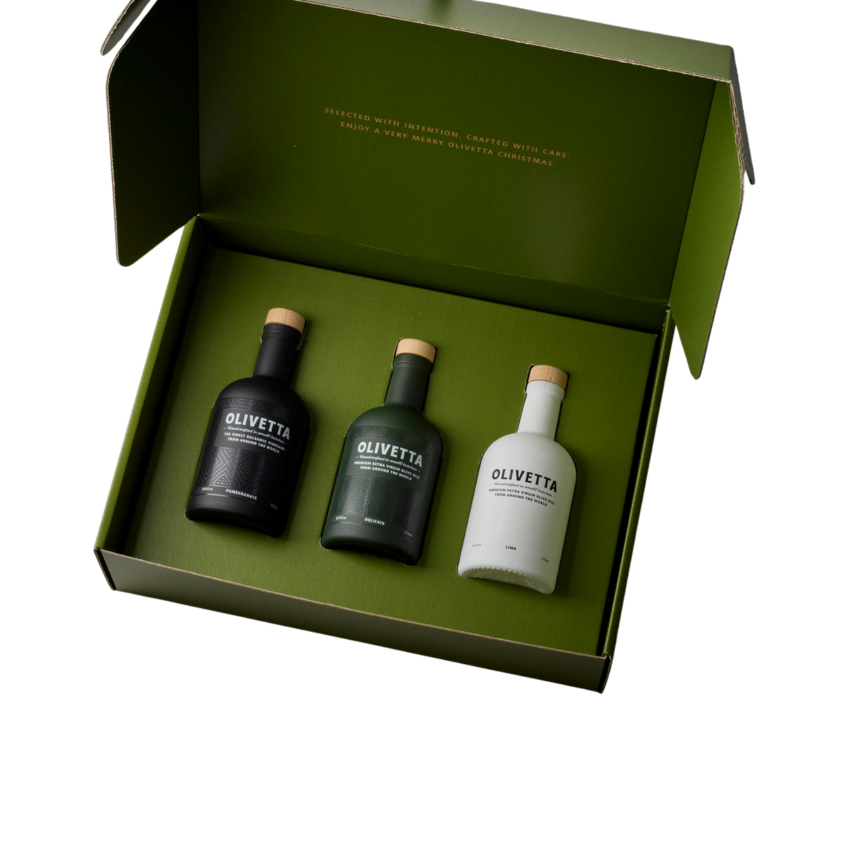An open Olivetta Christmas gift box, revealing the curated selection of extra virgin olive oil, vinegar and flavoured oils inside its presentation packaging.