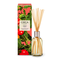CIRCA Fragrance Diffuser Tomato and Basil 250ml, glass reed diffuser bottle with reeds beside red tomato print box